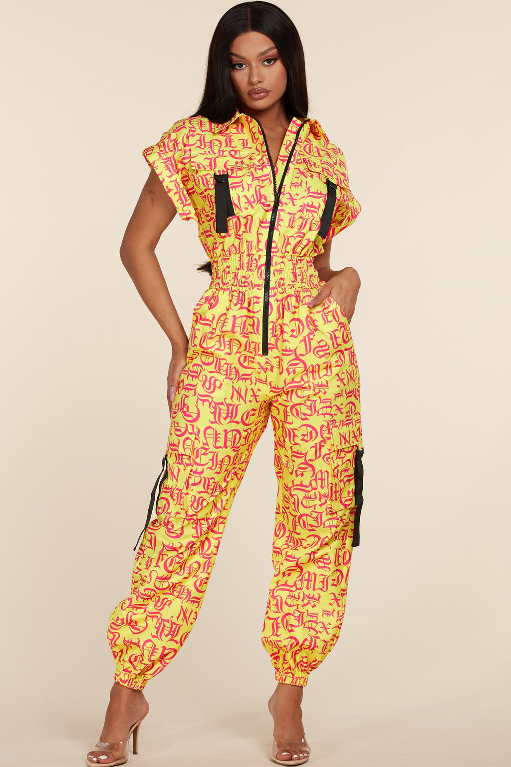 YELLOW JUMPSUIT WITH HOTPINK LETTERS - PRIVILEGE 