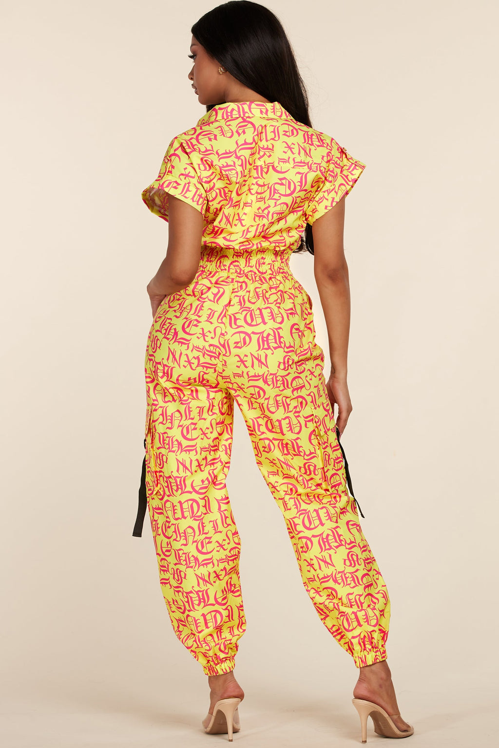 YELLOW JUMPSUIT WITH HOTPINK LETTERS - PRIVILEGE 