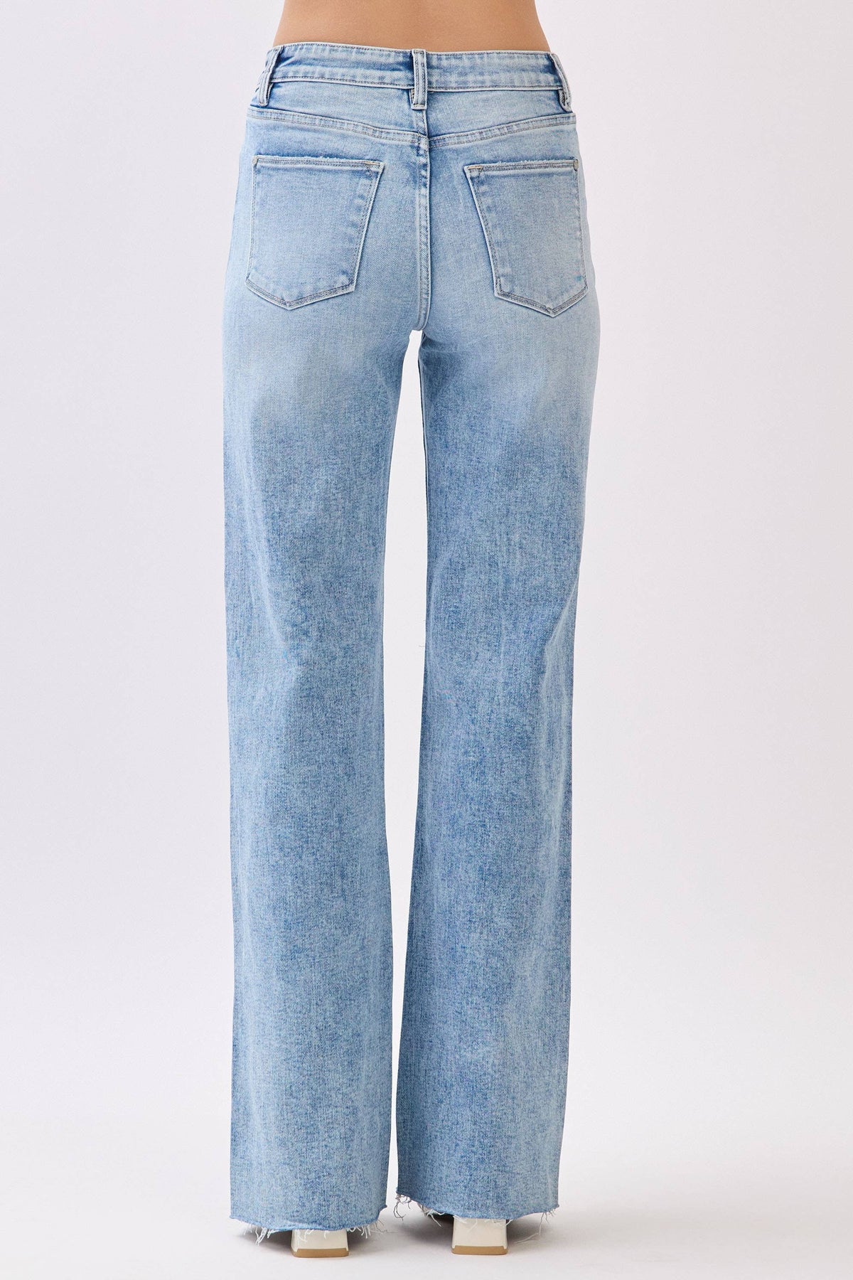 HIGH RISE STRETCH VINTAGE FLARE W/ RAW HEM JEANS