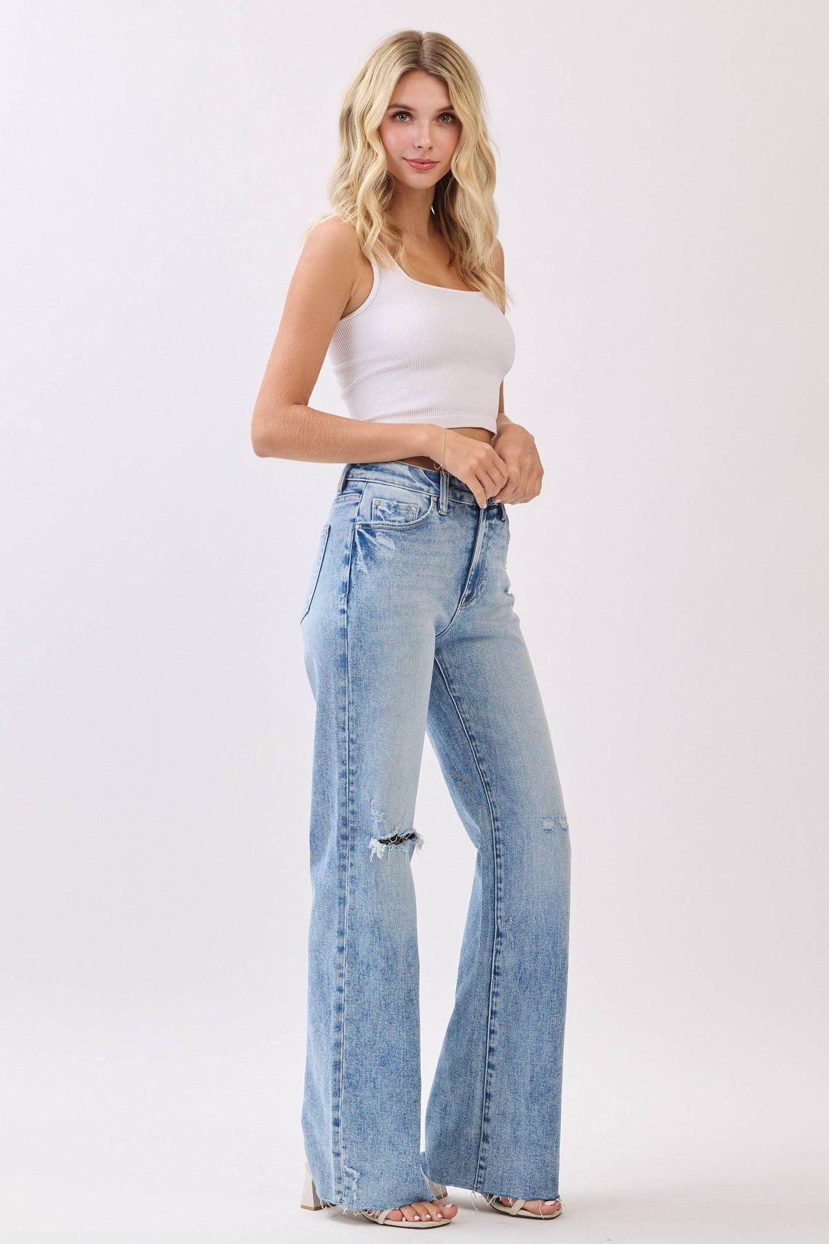 HIGH RISE STRETCH VINTAGE FLARE W/ RAW HEM JEANS