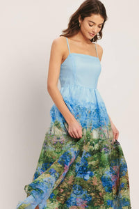 A printed woven midi dress
