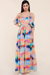 Colorful tie-dye maxi dress with off-shoulder sleeves, perfect for vacation outfits or women's fashion trends.