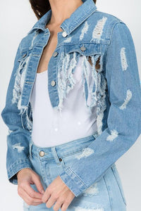 Distressed denim jacket and matching jeans for women's fashion, styled with a white top for casual or vacation outfits.