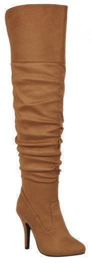 Tan suede over-the-knee boots with high heels, perfect for women's fashion and vacation outfits.