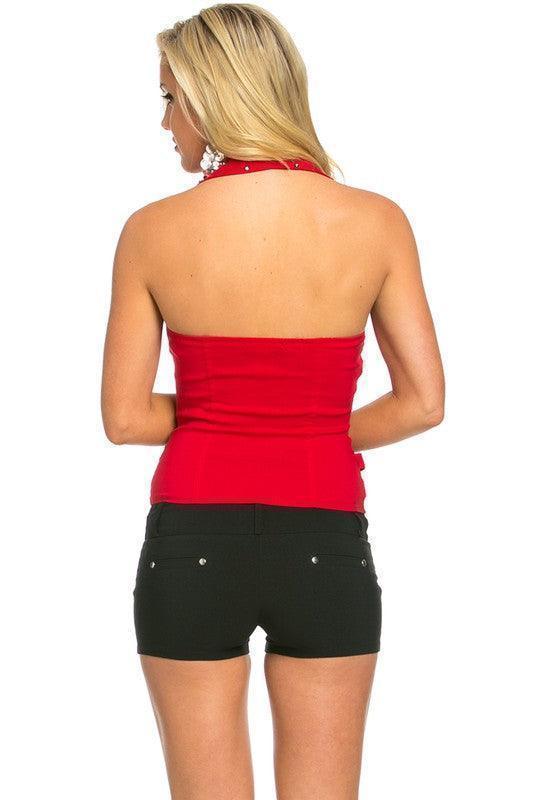 Red halter top with black denim shorts, perfect for women's fashion and vacation outfits